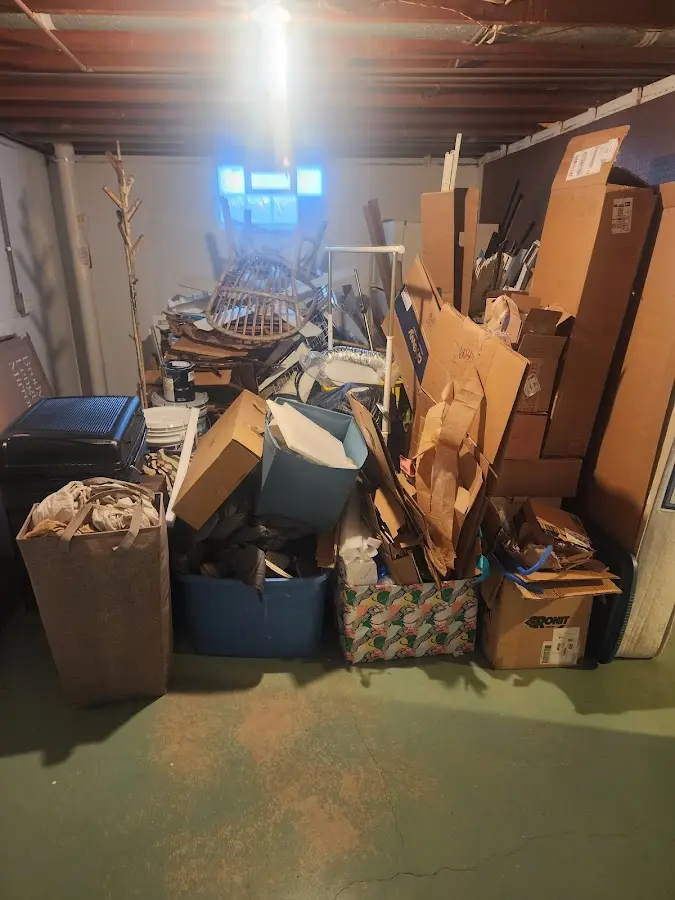 Roll-off dumpster container at job site for 2 Yard Dumpster Rental in Canyon Lake